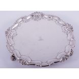 A George III style circular silver waiter, by Daniel & John Wellby, London 1899,