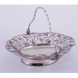 A George III oval silver basket, probably by William Plummer, rope-twist swing handle and border,