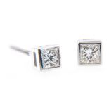 A pair of diamond single stone earrings, one princess cut diamond square set to each,