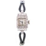 A lady's Art Deco diamond set cocktail watch,