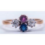 A diamond, sapphire and ruby four stone ring,