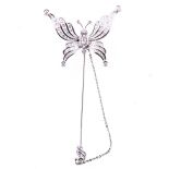 A large diamond butterfly pin that will convert to a smaller pin and pair of earrings,