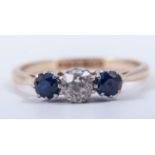 A sapphire and diamond three stone ring,