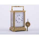 Stevenard, Boulogne A French gilt metal carriage clock, white enamelled dial with Roman numerals,