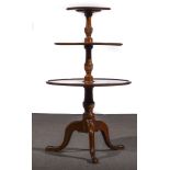 A George III mahogany three-tier whatnot, circular tiers with moulded outlines,