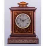 A late Victorian inlaid mahogany mantel clock, in the style of Maple & Co.