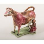 A Pratt type cow and milkmaid creamer, North-East region, 1800-1820,