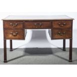 A George IV mahogany desk, tooled leather inset, fitted with five drawers,