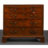 A George III mahogany chest of drawers, rectangular top with a moulded edge,