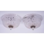 A pair of cut glass ceiling shades, circular domed form, hobnail cut,