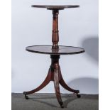 A George III mahogany whatnot, two graduated circular tiers each with moulded edge,