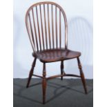 A set of eight elm and ash Windsor type chairs, 20th Century, hoop backs with turned spindles,