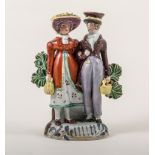 A Pearl glazed earthenware bocage group of Dandies, Staffordshire, circa 1820,