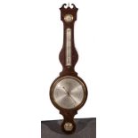 Thomas Bates, Market Harborough A banjo shaped wall barometer, broken swan neck pediment,