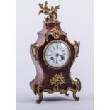 A Louis XV style 'tortoiseshell' veneered and gilt metal mantel clock, French, late 19th century,