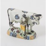 A Prattware, cow, calf and gardener group, Yorkshire, 1800-1820,