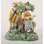 A Walton type earthenware bocage group, 'The Flight to Egypt', late 18th century,