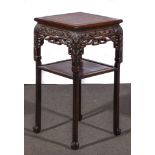 A Chinese carved hardwood stand, square shaped top with a marble inset,