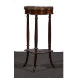 A French Second Empire rosewood and inlaid table a ouvrage, of triform section,