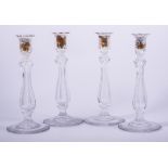 A set of four cut glass table candlesticks, circa 1900, hexagonal stems, circular bases, 30cm.