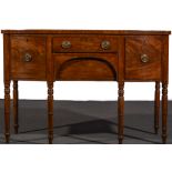 A George III mahogany bowfront sideboard, fitted with drawers and a cupboard, ebony stringing,