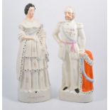 A pair of Staffordshire pottery figures, King and Queen of Prussia, 44cm.