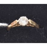 18ct diamond solitaire ring.