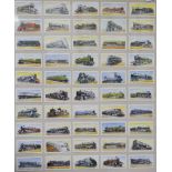 Eleven framed sets of cigarette cards, including footballers, MG cars, railway locomotives etc,