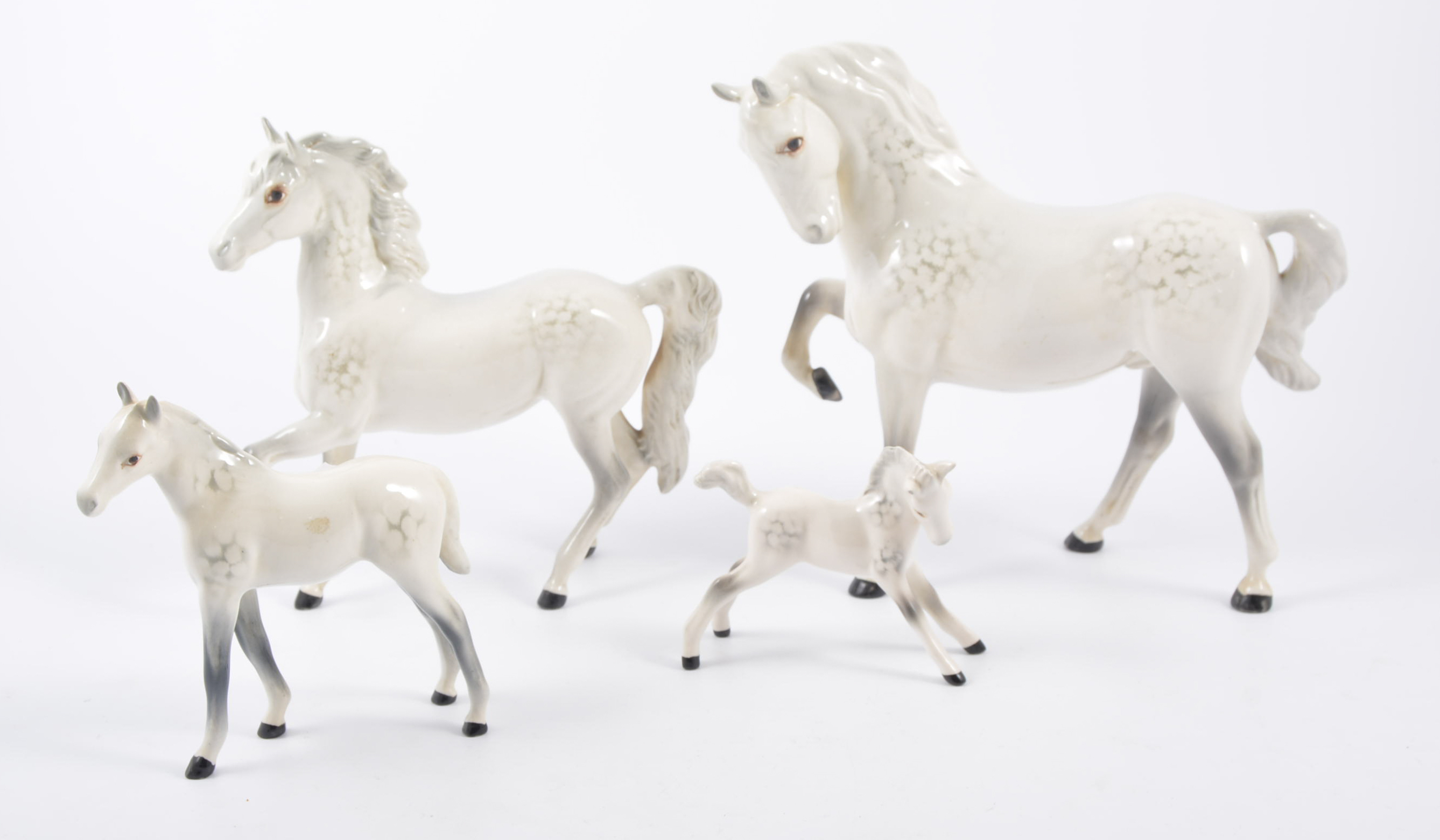 Beswick horse figures; no.815 grey gloss horse, no.1813 grey gloss foal, no.