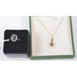 9ct sapphire and diamond dress ring and matching pendant.