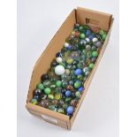 Large collection of glass marbles, various sizes, six boxes.