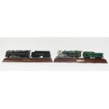 Two Franklin Mint model locomotives on wooden bases,