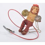 Automated monkey toy with cymbals, hand operated pulley to back.