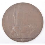 A WWI Bronze Death plaque, named - alfred Watts, Woolwich Arsenal stamp, 12cm.