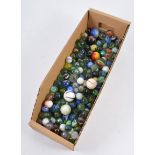 Large collection of glass marbles, various sizes, five boxes.