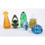 Selection of glass and plastic paper weights, some with suspended bubble form.