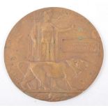 A WWI Bronze Death plaque, named - William Dawson, Woolwich Arsenal stamp, 12cm.