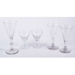 Two Georgian wine glasses, each with a folded foot, Victorian wine glasses, other crystal,