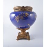 Royal Bonn blue ground jardiniere, with applied gilt metal rim and stand, 32cm.