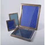 Silver photograph frame, Birmingham 1991, 29 x 24cm and three other photograph frames, (4).