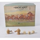 Escalado set, Dominoes, Ivory Dice, and two tape measures.