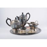 Silver-plated five-piece teaset including tray, and a pair of glass and silver-plated table salts.