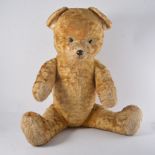1930s Plush Teddy bear, straw filled, jointed limbs, height 41cm.