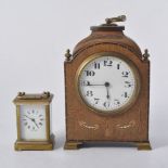 Edwardian stained wood and inlaid bracket clock, 22cm, and a carriage clock.