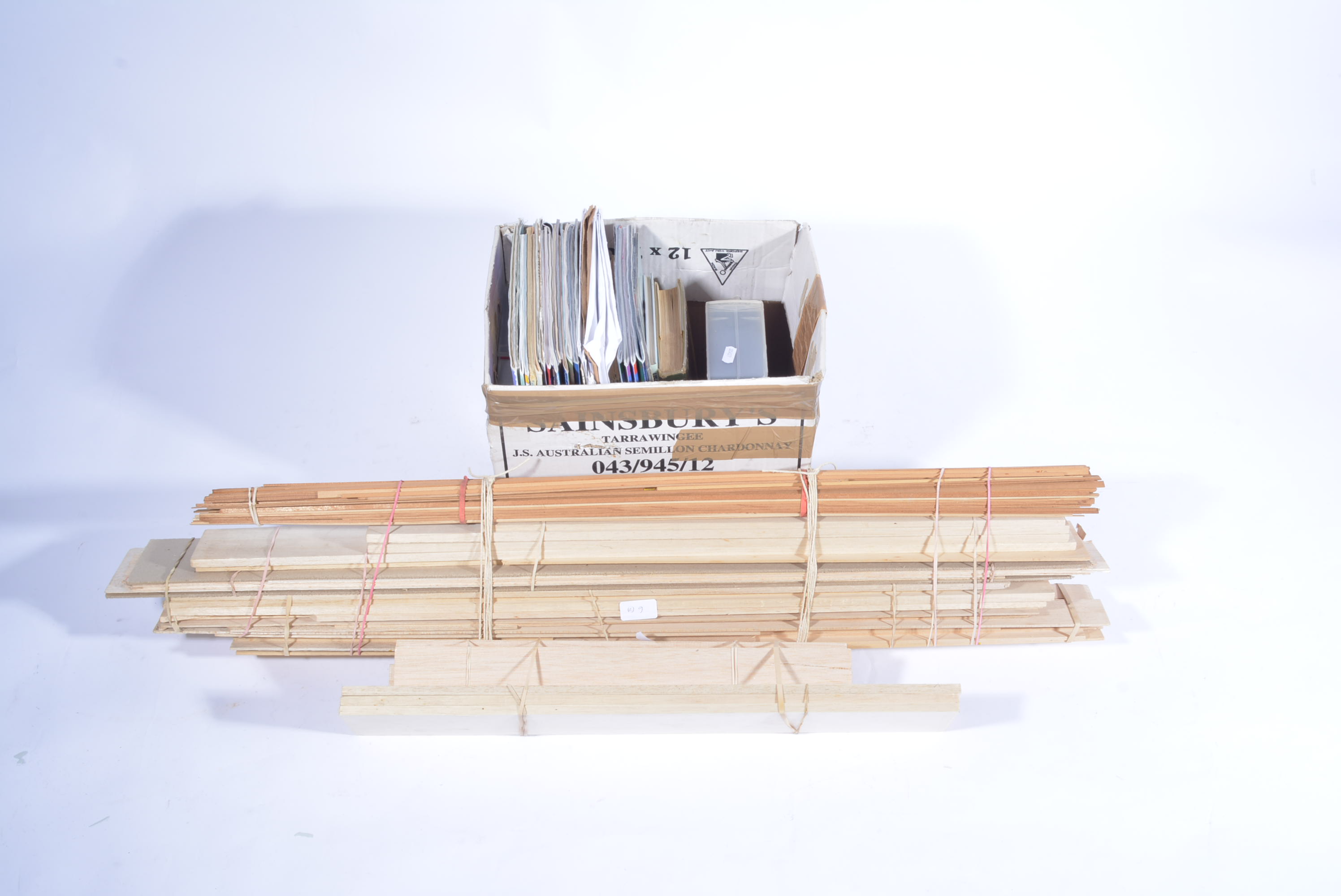 Large quantity of Balsa wood and box containing magazines, plan, etc.