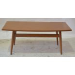 Scandart Limited 1960s teak coffee table, shaped rectangular top on tapered suports,bears label,