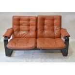 Stylish Scandanavian two seat settee, circa 1970, brown stitched leather seats and palm rests,