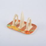 Clarice Cliff, 'Nasturtium' a toast rack, with three dividers, brown cafe-au-lait ground,