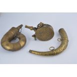 19th Century Asian brass and steel powder horn, a 19th Century North African brass powder horn,