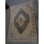 Hamadan carpet, central ivory coloured lozenge medallion on a blue ground, border within guards,